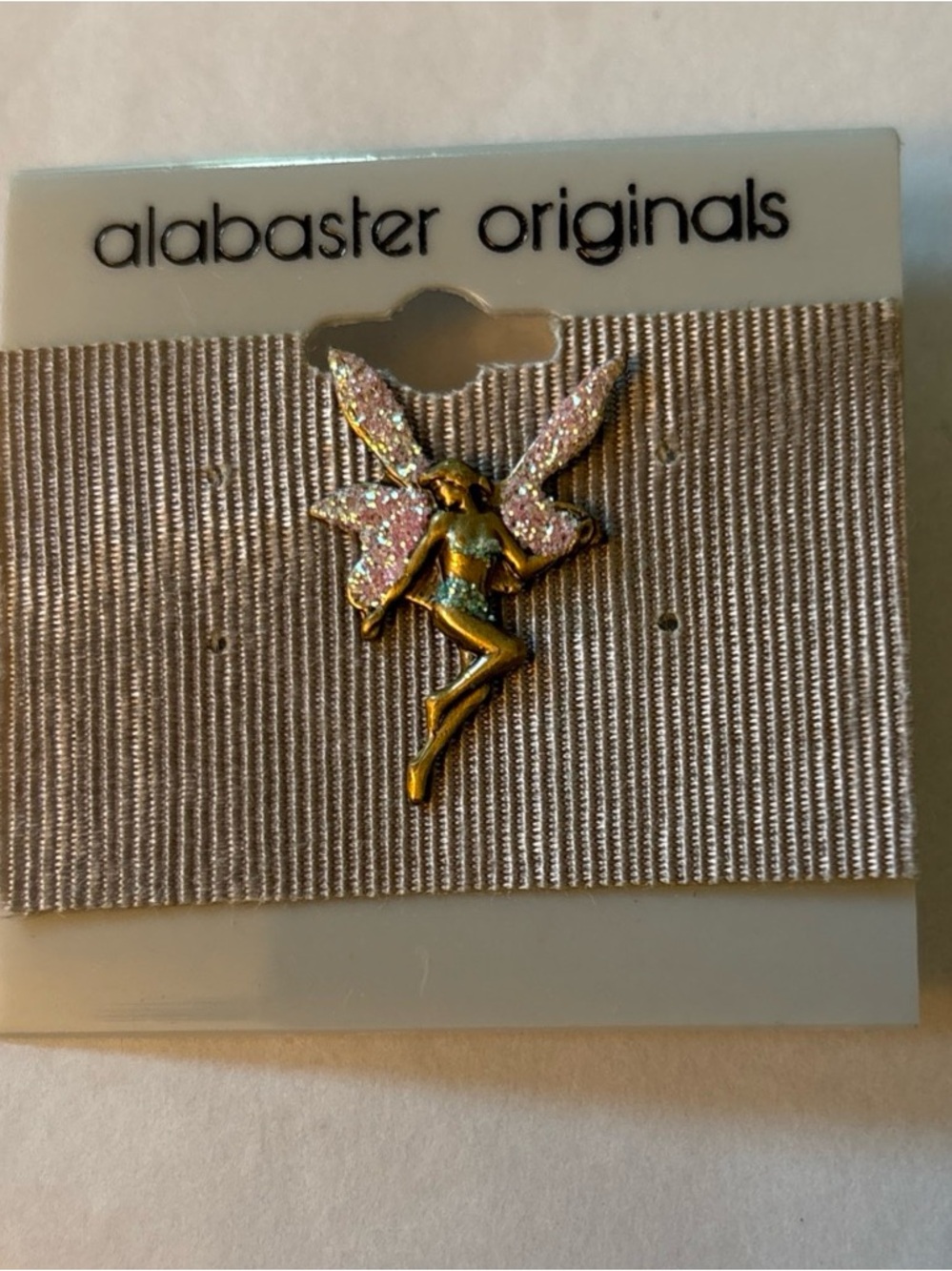 Vintage Alabaster Originals fairy Pin . Pin is approximately 1 inch tall.